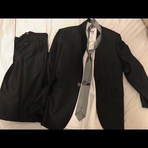 Men black suite with ties and pants, size small.